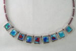 silver pendant with little pentands 3