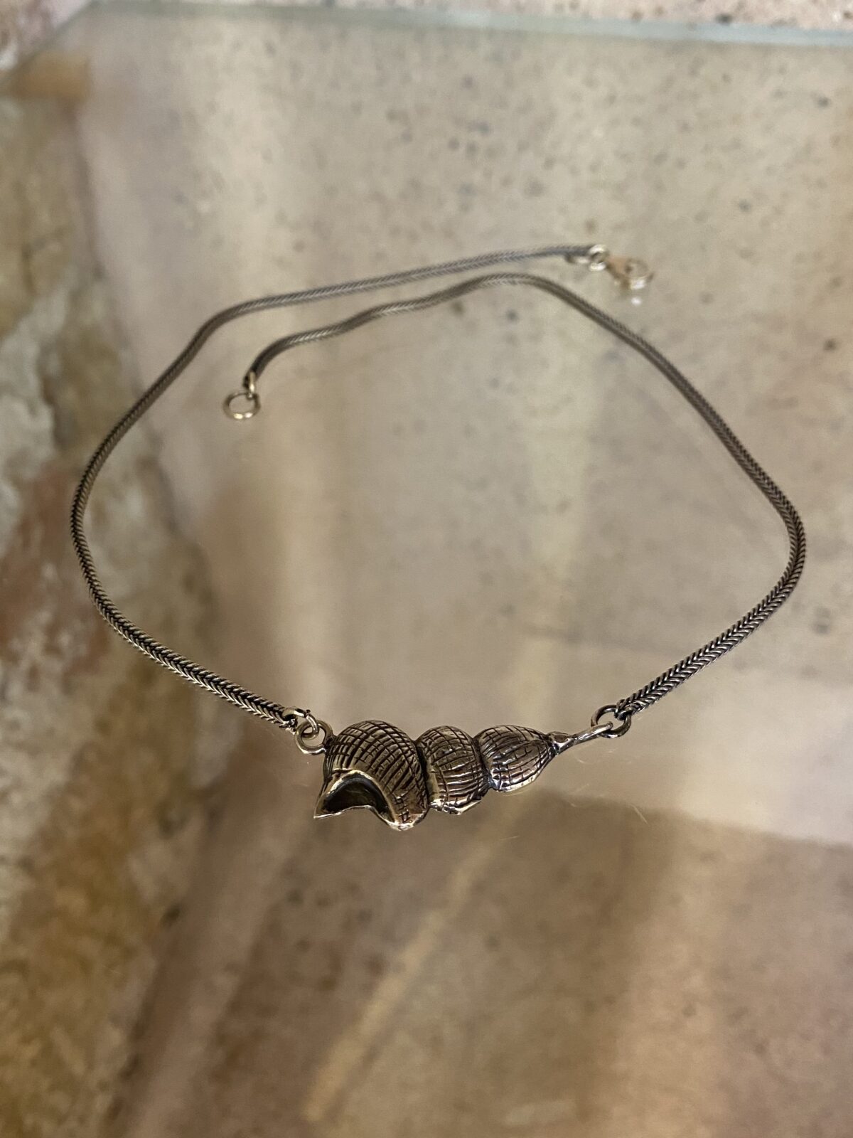 437233DB-76AA-4D9A-84C3-7E6475F4787B Sea snail necklace - Image 1